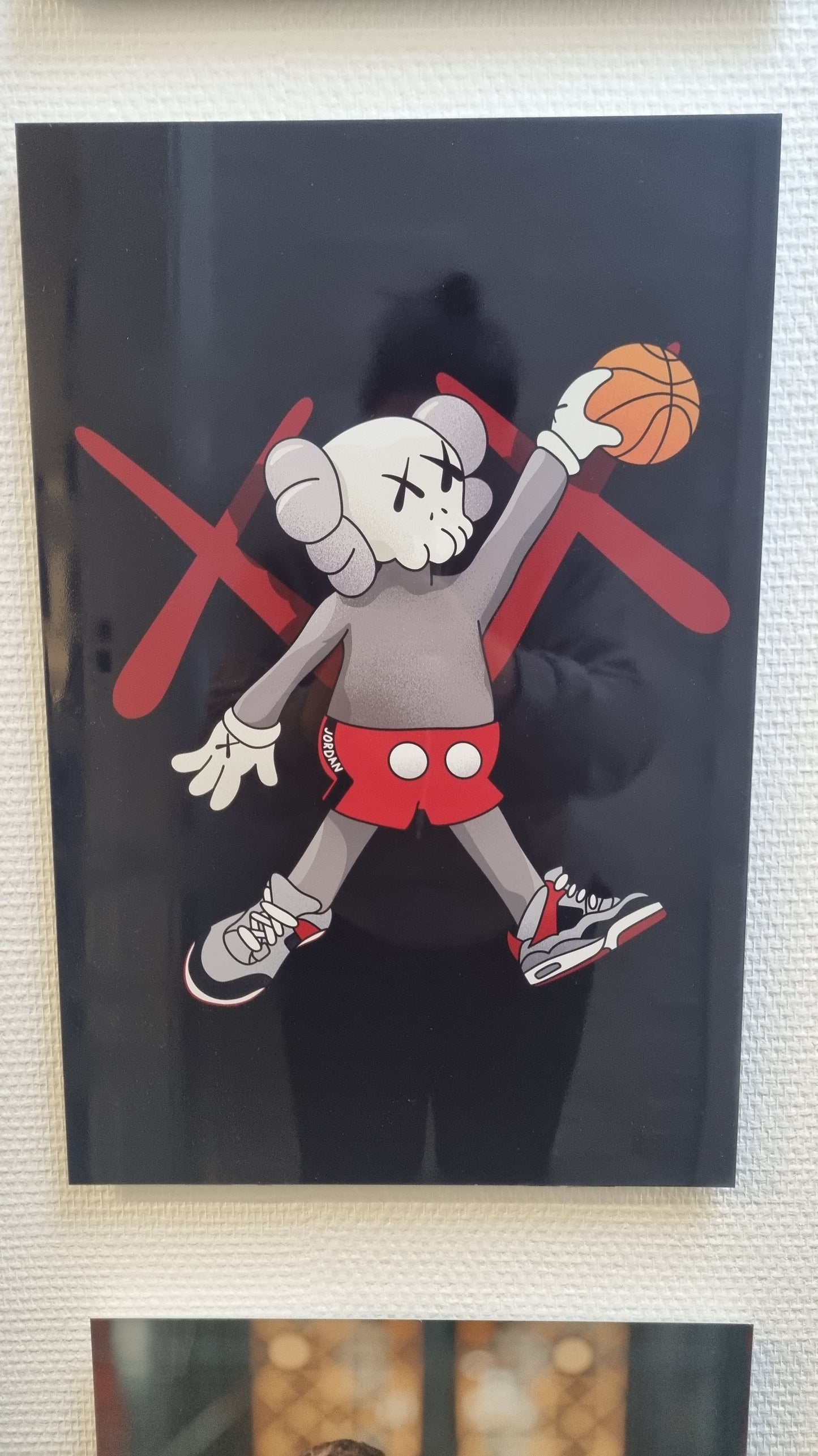 KAWS spiller basketball