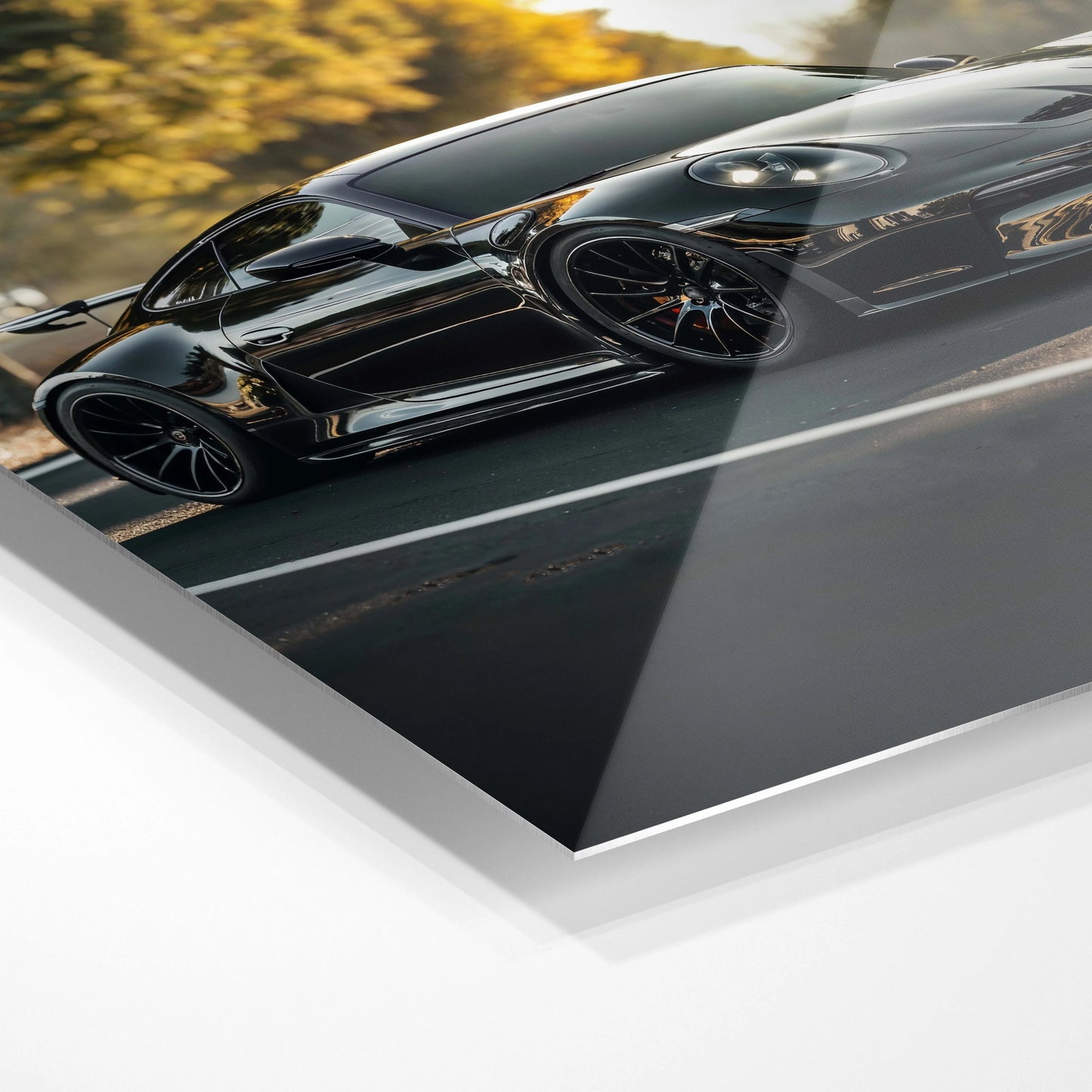 Sort Porsche i solen